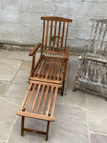 Garden furniture on neatly laid paving slabs